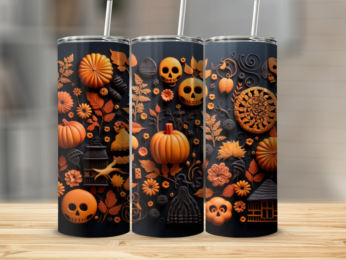 Tumbler with Halloween motifs of pumpkins, skulls, flowers, and leaves.