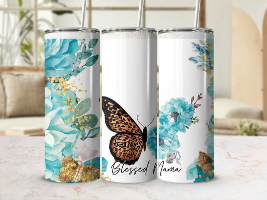 Floral design with a butterfly and "Blessed Mama" text on a white tumbler.
