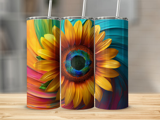 Three tumblers featuring vibrant, abstract sunflower designs on a wooden surface.