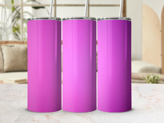 Three pink tumblers with straws on a marble surface.