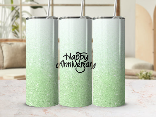 Green glitter tumbler with "Happy Anniversary" text and straw.