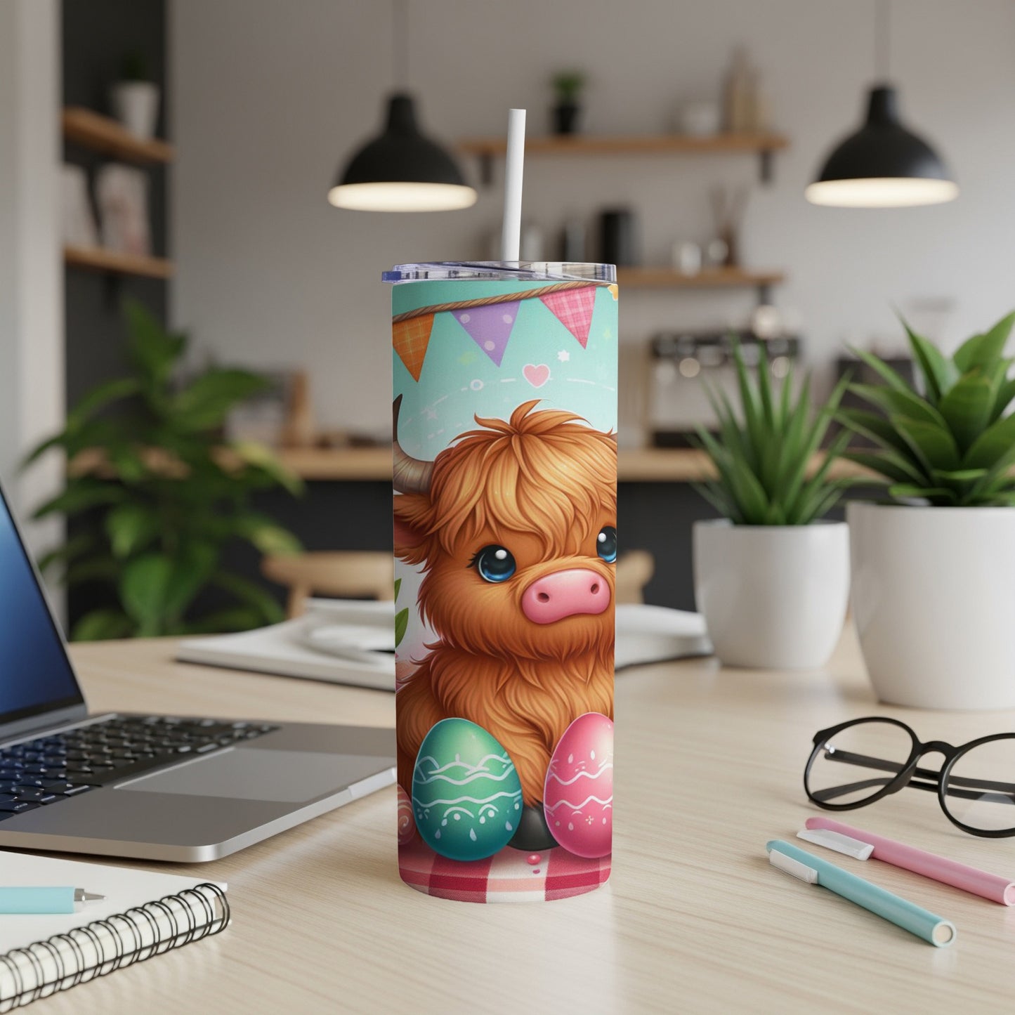 Highland cow illustration with Easter eggs on a tumbler.