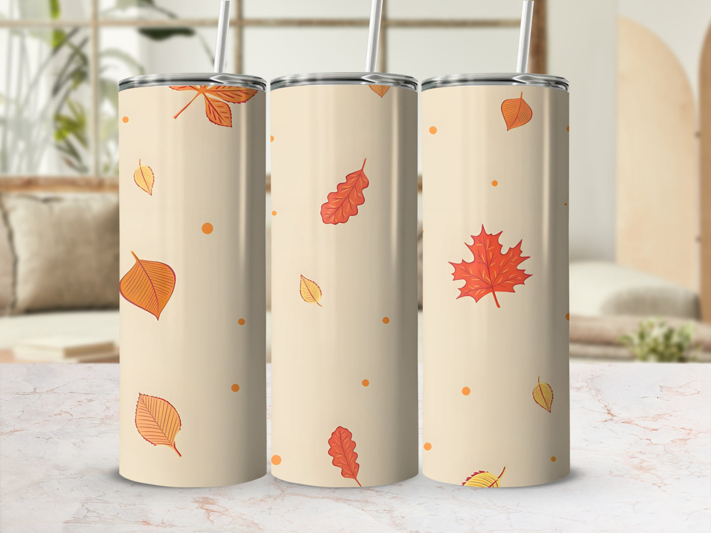 Cream tumbler with scattered autumn leaves and polka dots.