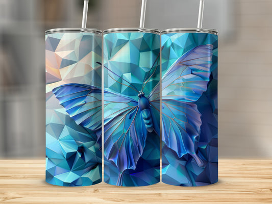 Three tumblers with a blue butterfly design on a faceted geometric background.