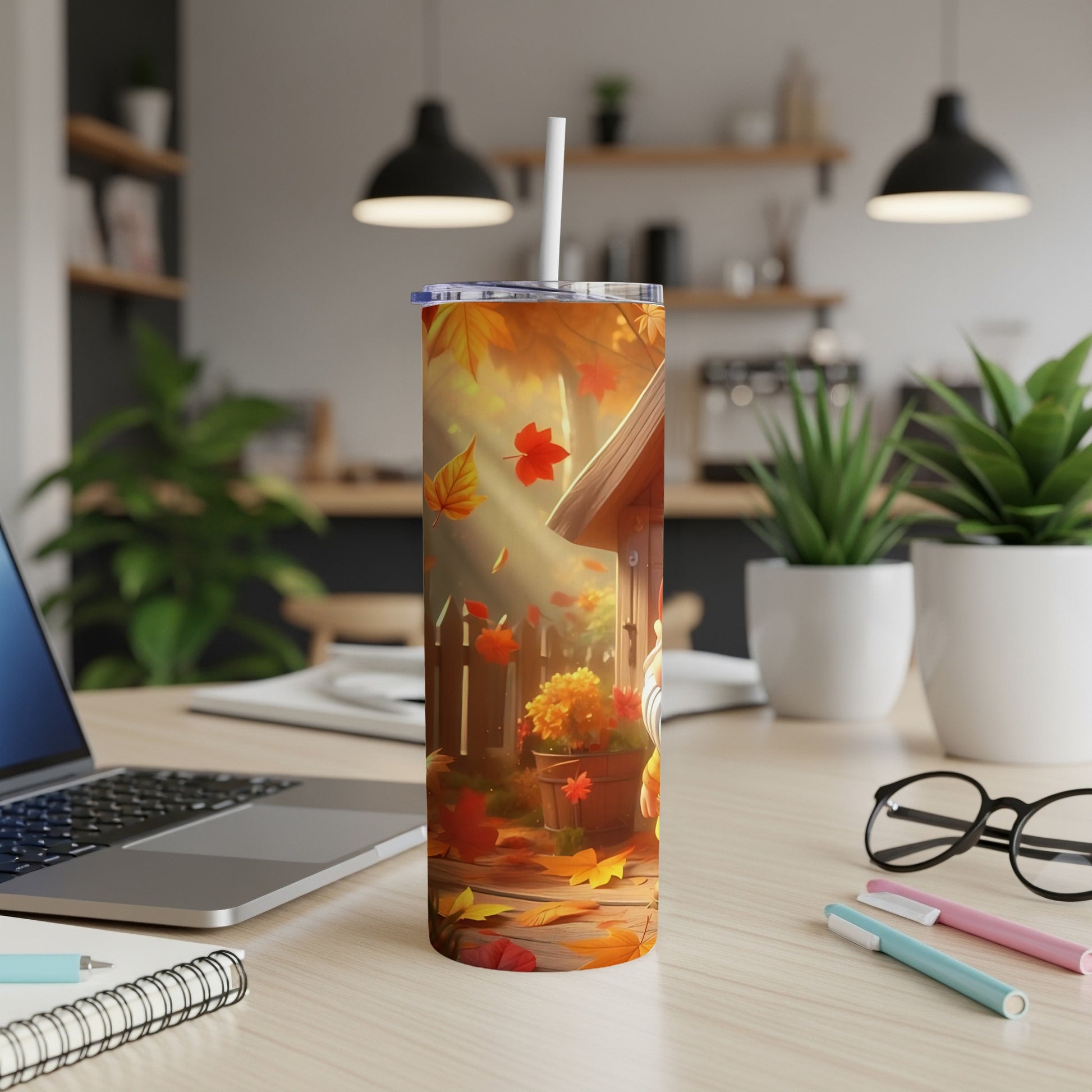 Tumbler with falling autumn leaves and a wooden fence illustration.