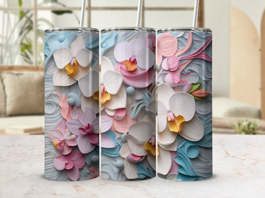 Three tumblers with pastel floral designs in a light-filled room.