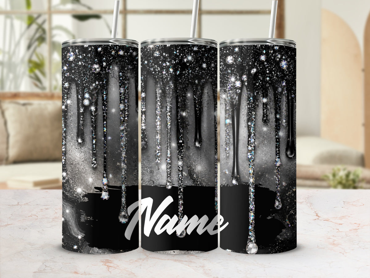 Three tumblers with black dripping glitter and crystal accents, one displays the word "Name".