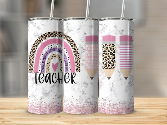 Teacher tumbler with rainbow, heart, and pencil designs.