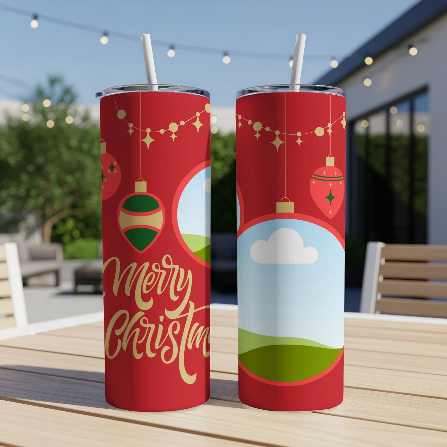Two red tumblers with a gold Merry Christmas design and holiday ornaments.