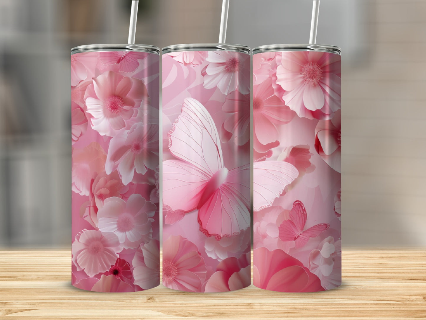 Pink floral pattern with butterflies on three tumblers.