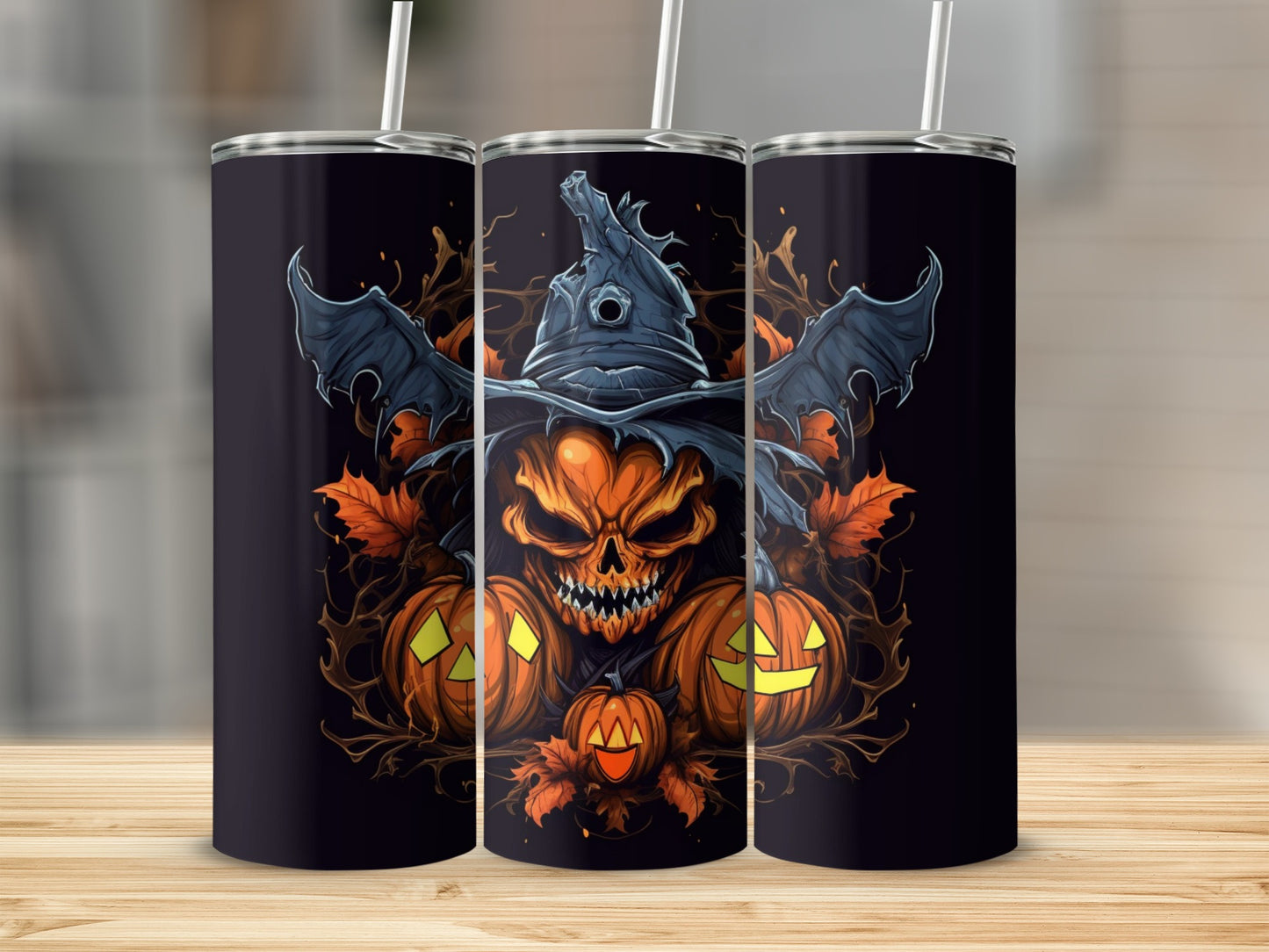 Halloween tumblers with a spooky pumpkin skull design and bat wings.
