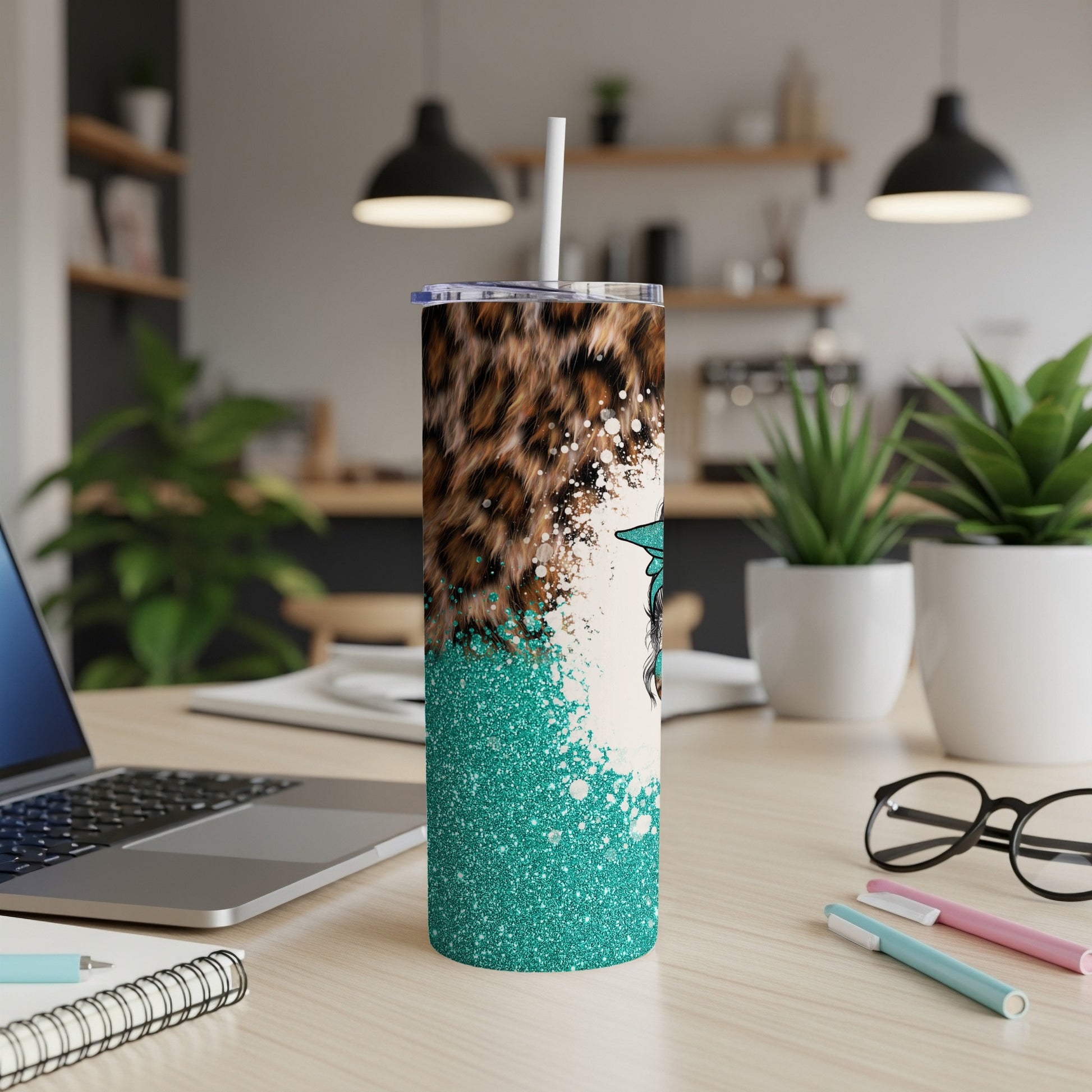 Glitter teal tumbler with leopard print and turquoise graphic.