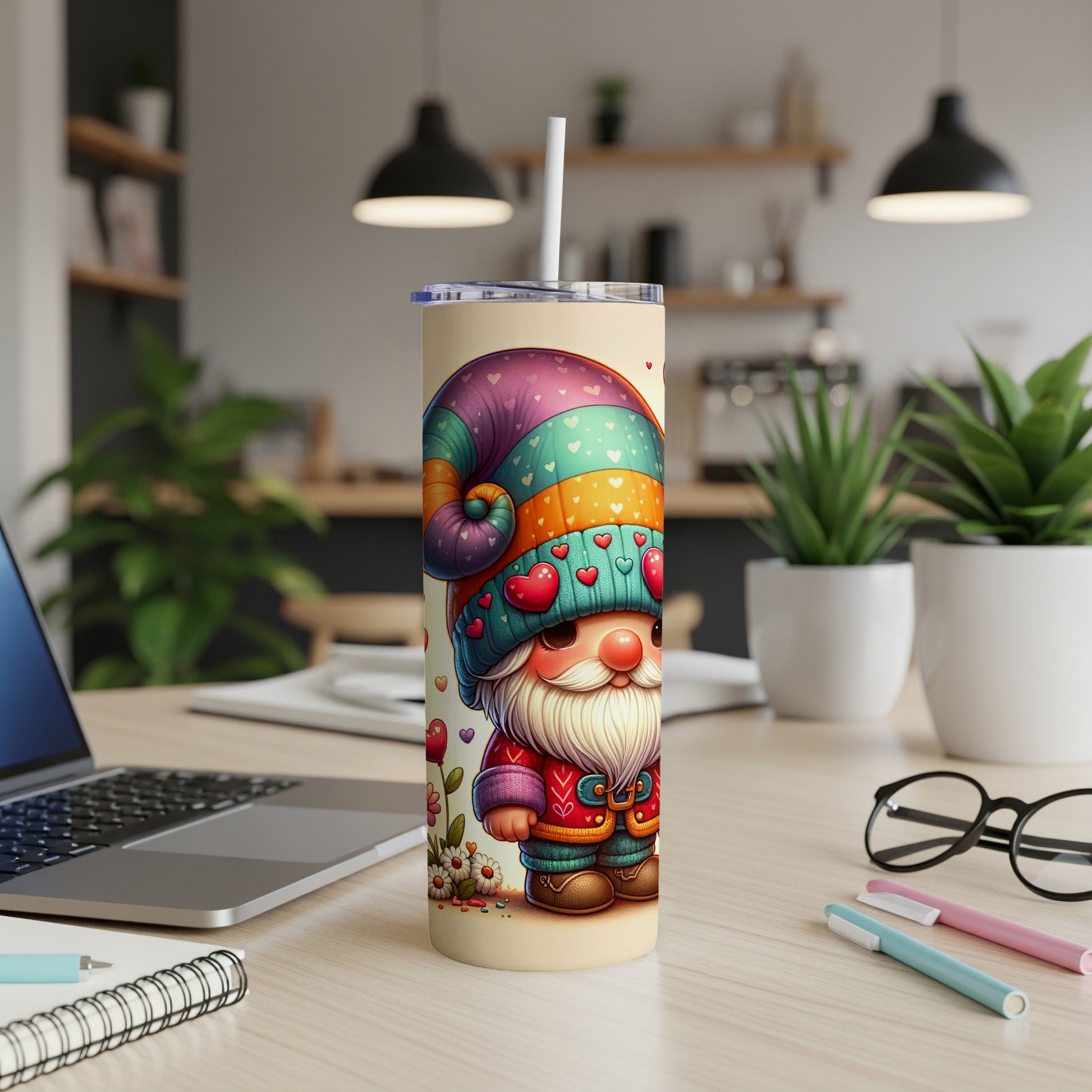 Gnome illustration on a tumbler with hearts and colorful striped hat.