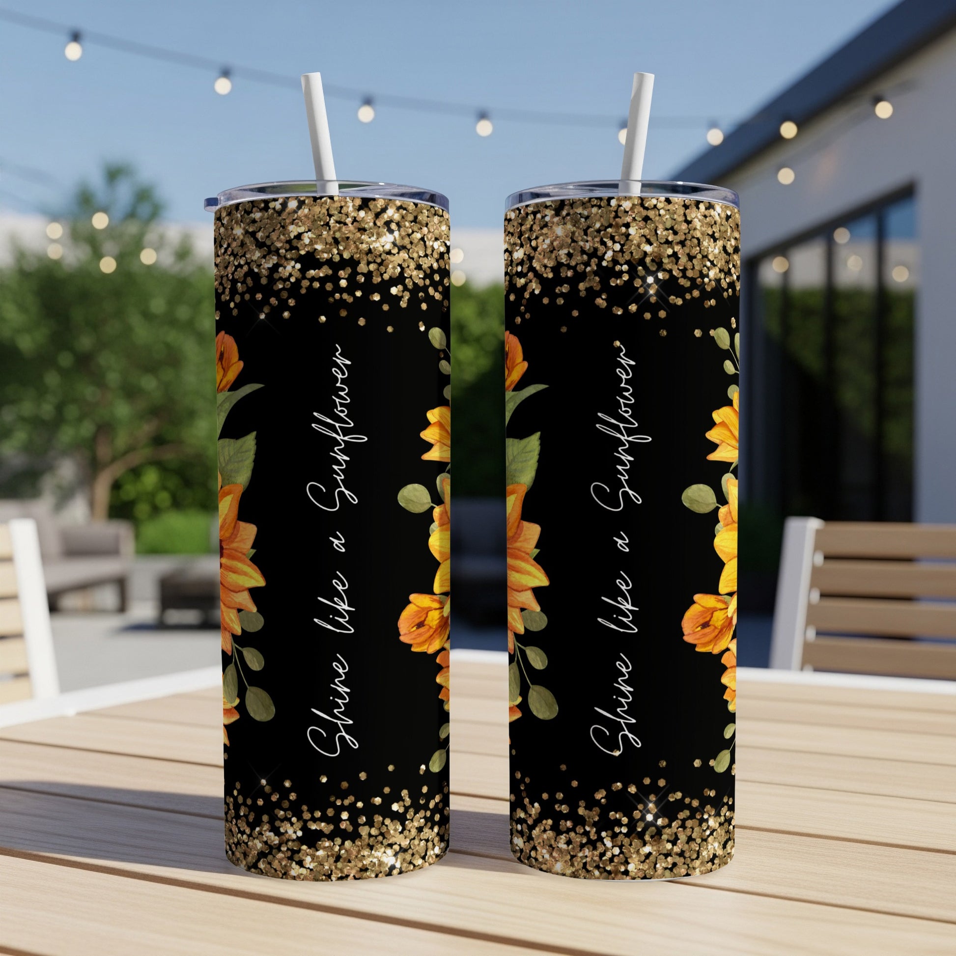 Two black tumblers with gold glitter and sunflower design, "Shine like a Sunflower" text.