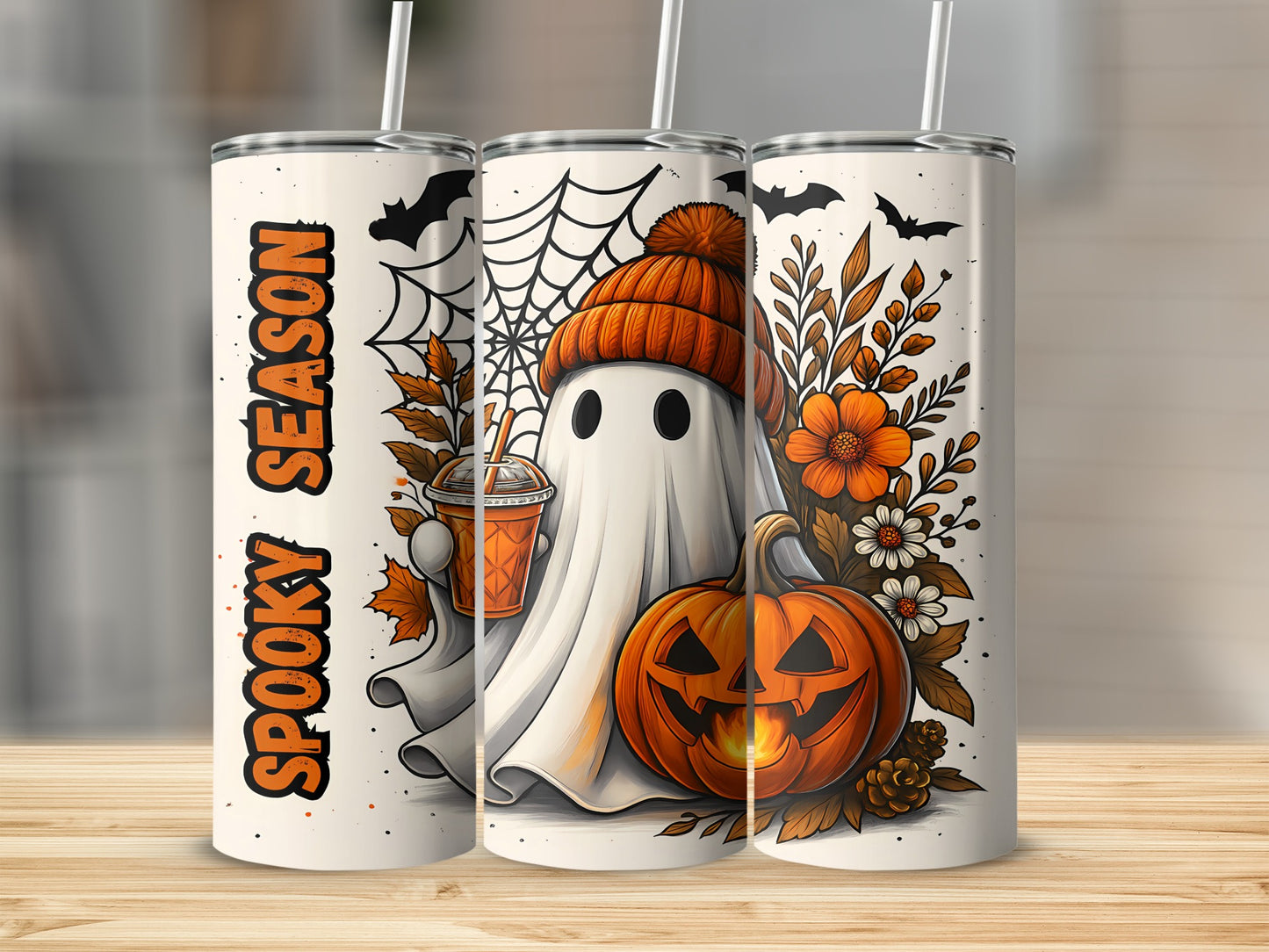 Tumbler with ghost, pumpkin, flowers, bats, and text "SPOOKY SEASON".