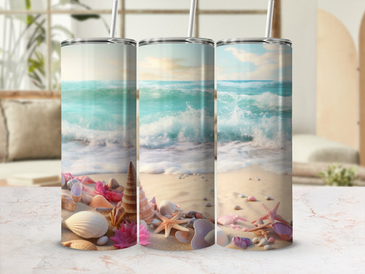 Three tumblers with a beach and ocean scene design.