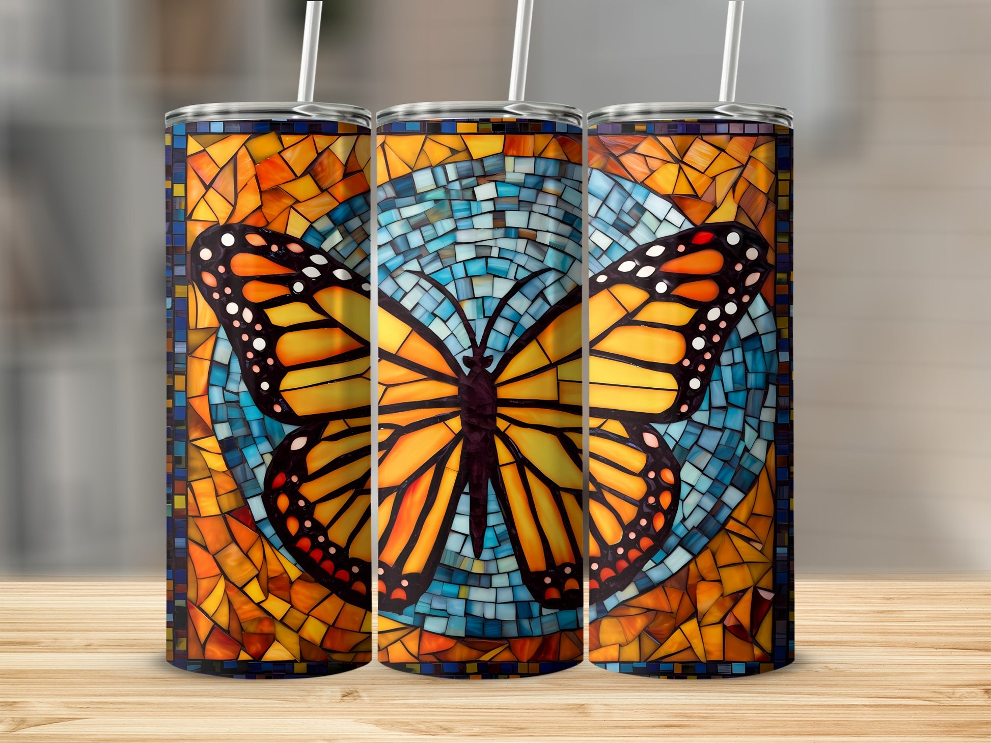 Monarch butterfly on a stained-glass mosaic patterned tumbler.