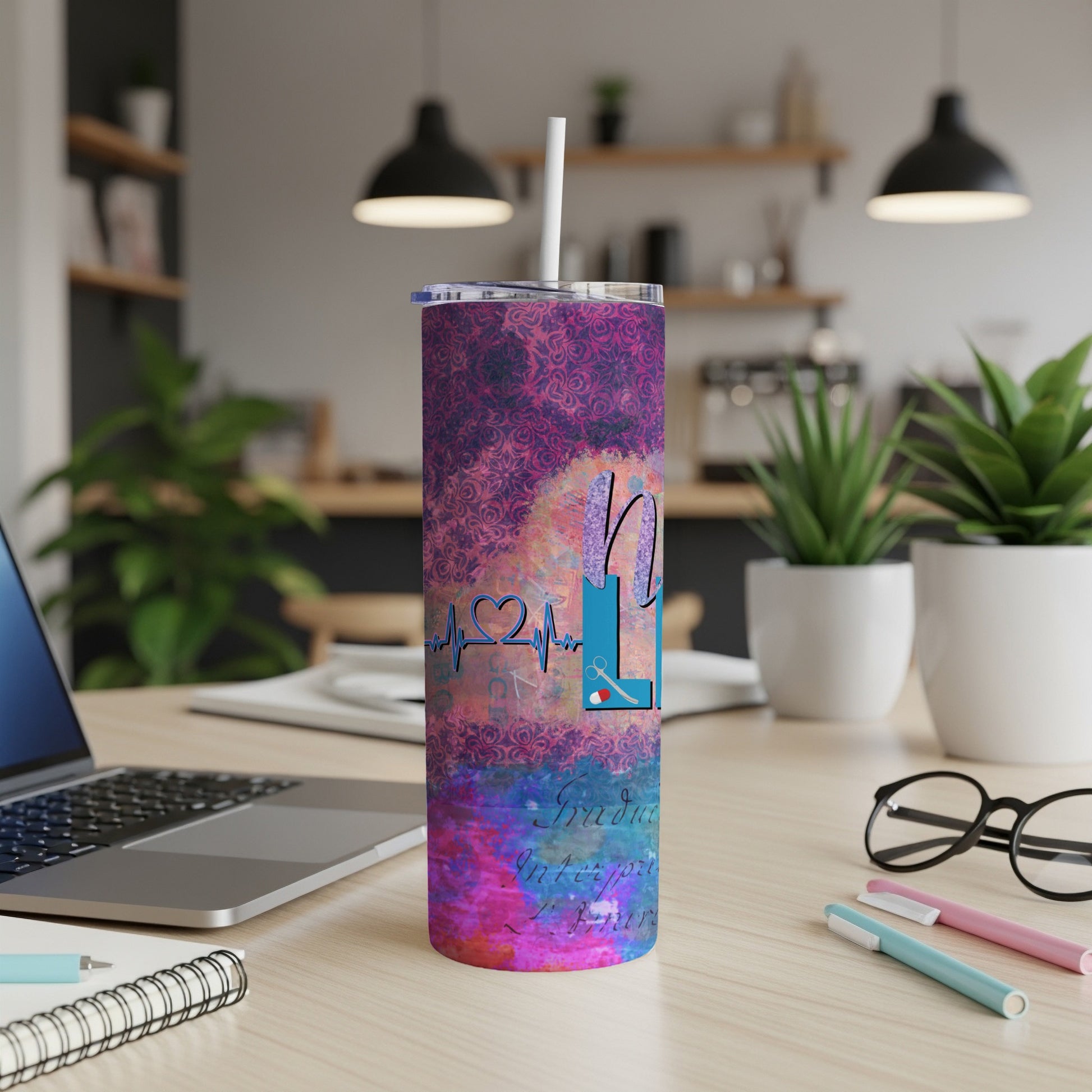 Tumbler with "Graduate Interpreter" text and a heart monitor design.