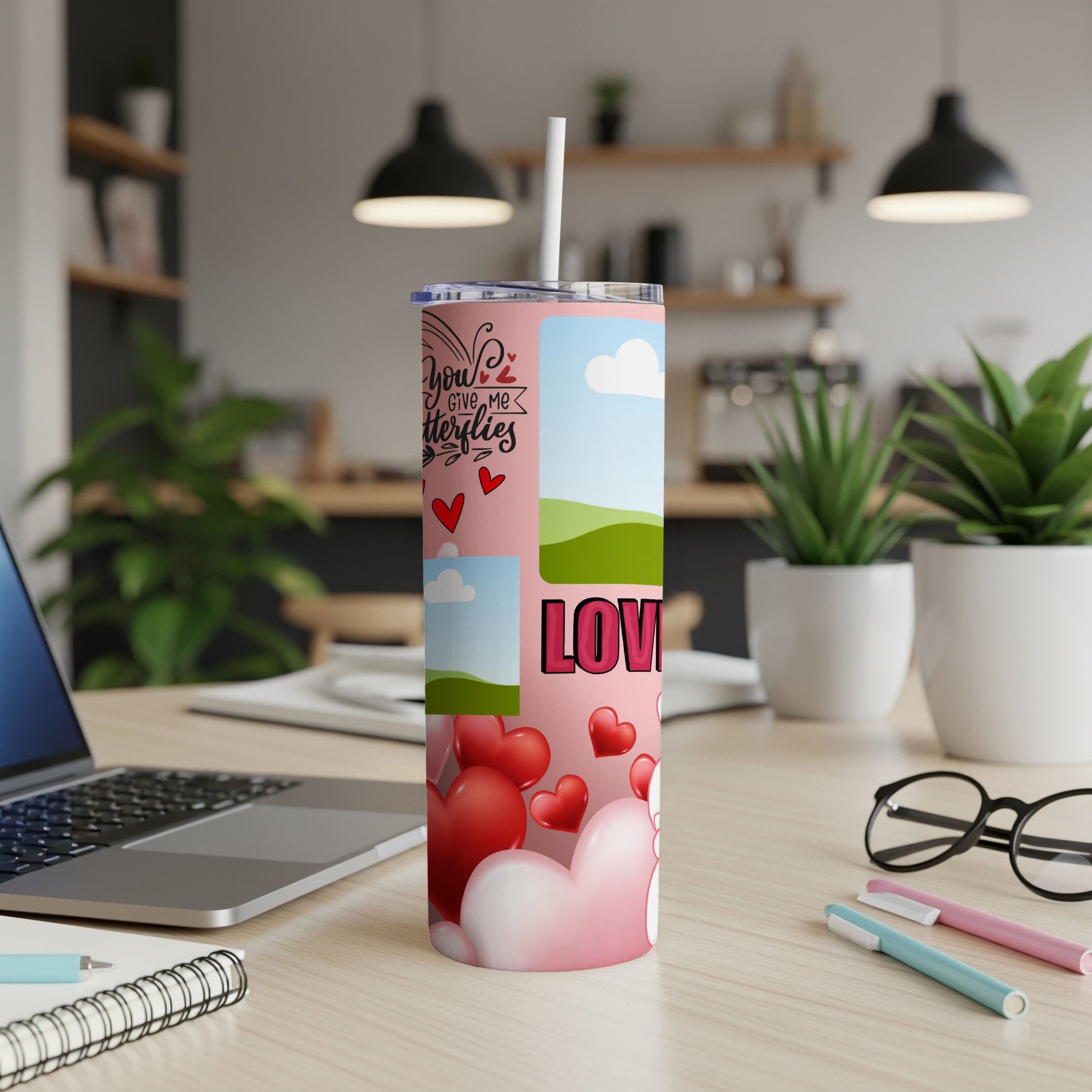 Pink tumbler with hearts, clouds, and "Love" text with "You give me butterflies" quote.