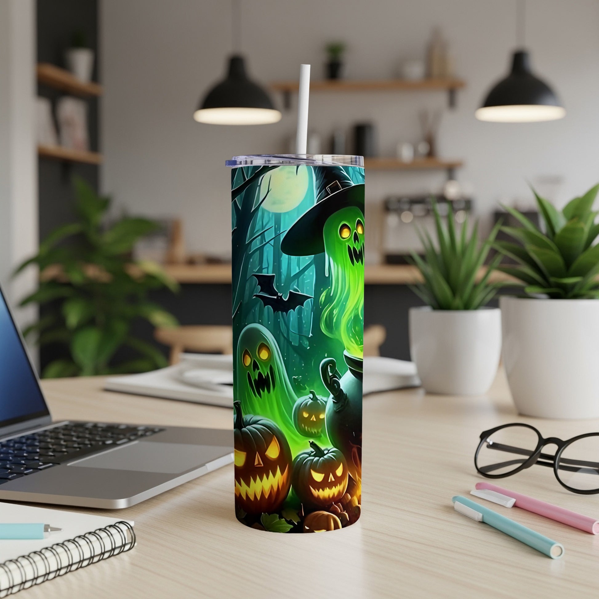Halloween tumbler with ghosts, pumpkins, bats, and a witch hat design.