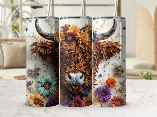 Highland cow with floral accents and swirling golden vines on a tumbler.