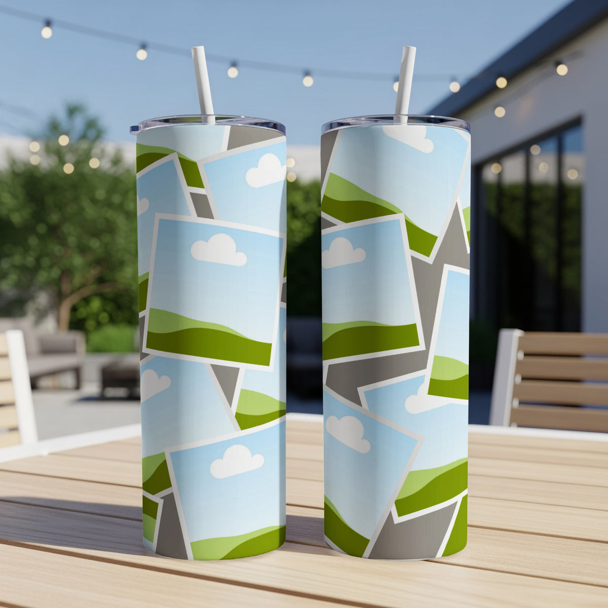 Two tumblers with a collage of landscape photos, each with a white straw.