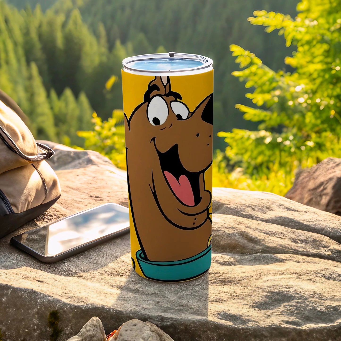 Scooby-Doo character face on a brown tumbler with blue band.