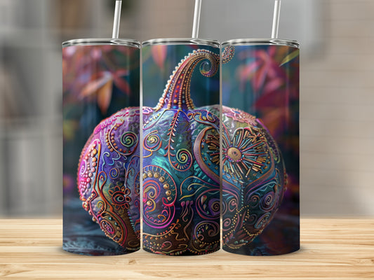Ornate, colorful pumpkin tumbler with swirling patterns and floral accents.