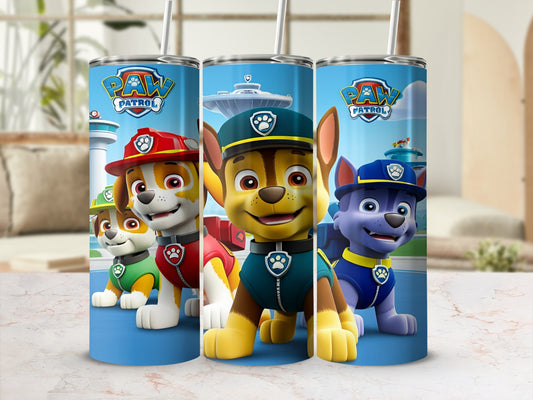 Paw Patrol characters Chase, Marshall, and Rubble on a blue tumbler.