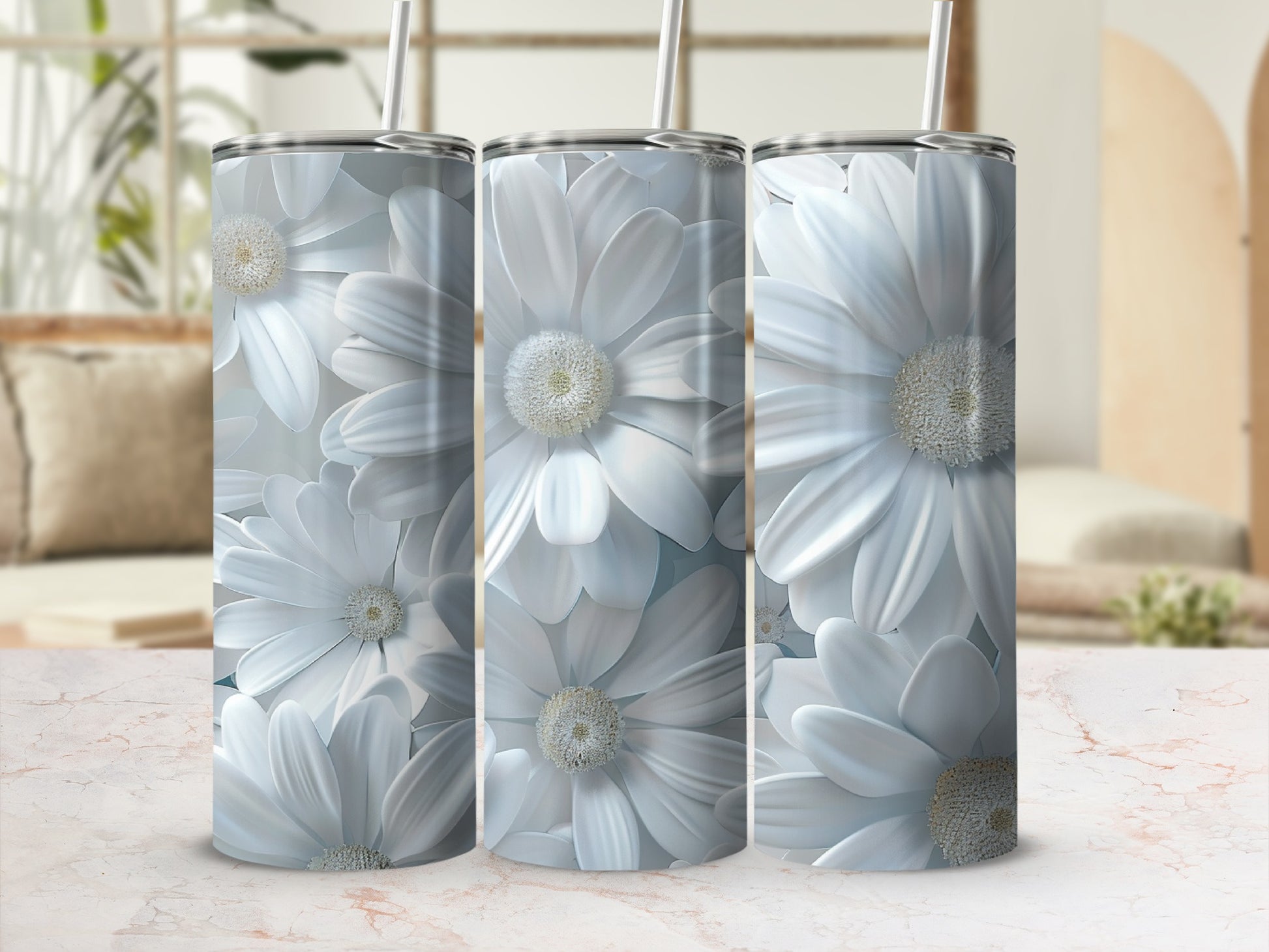 White daisy flowers pattern on a set of three tumblers.