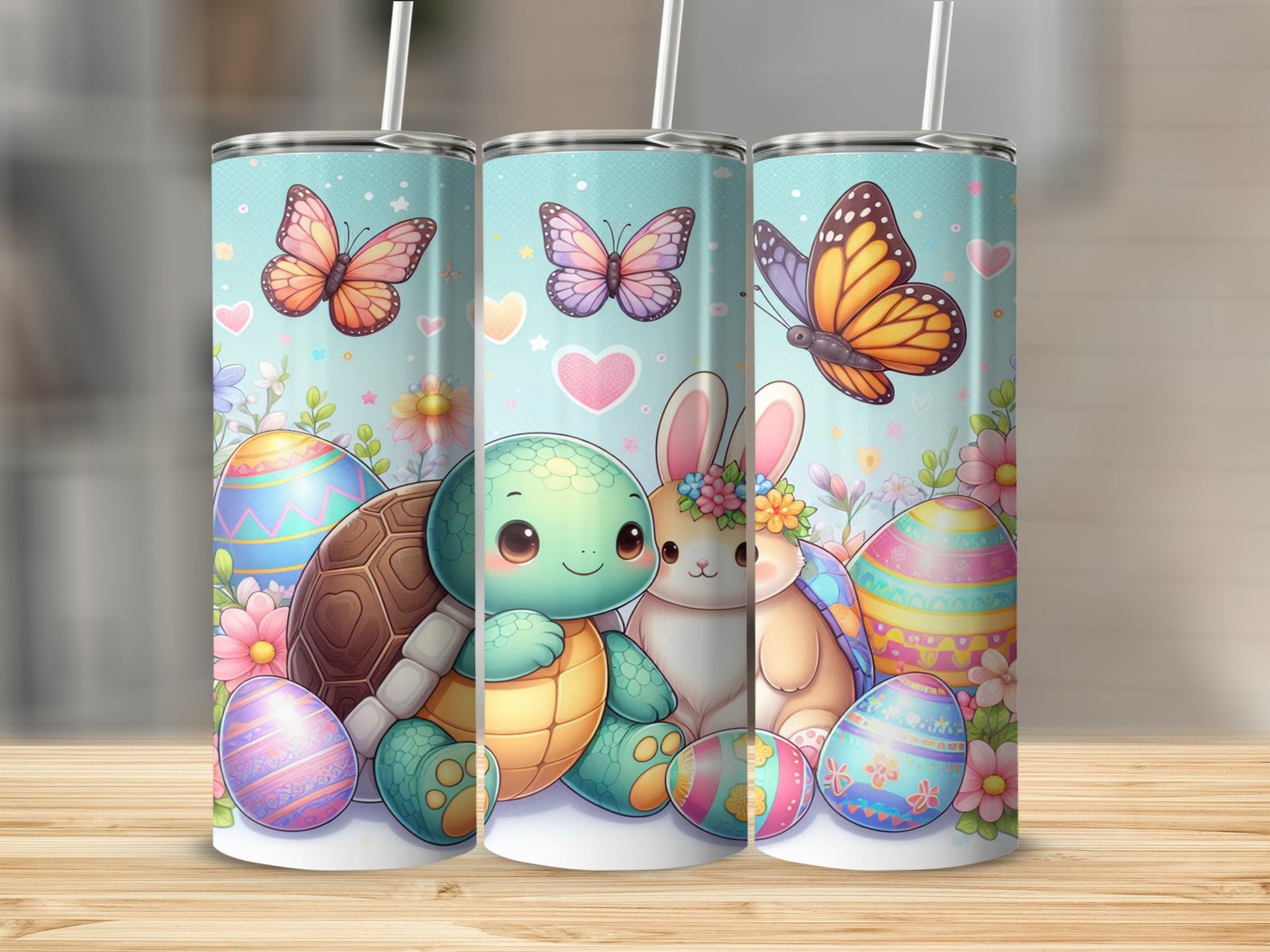 Easter-themed tumblers with a turtle, bunny, butterflies, and decorated eggs.