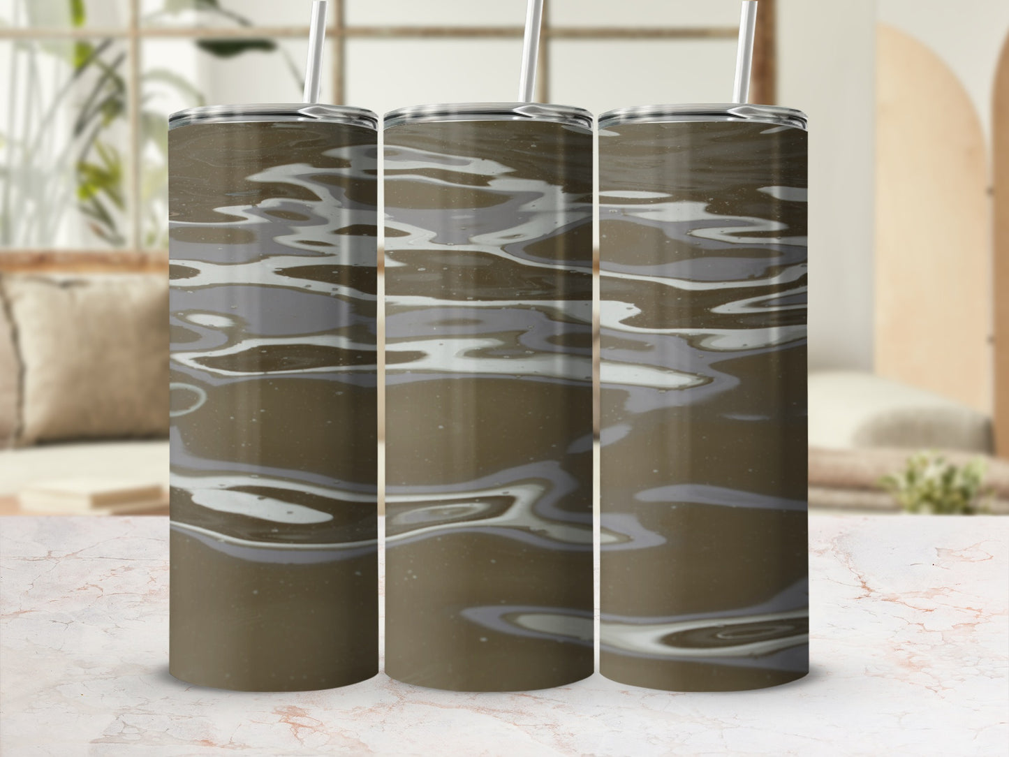 Three tumblers with a wavy, abstract brown and white design.