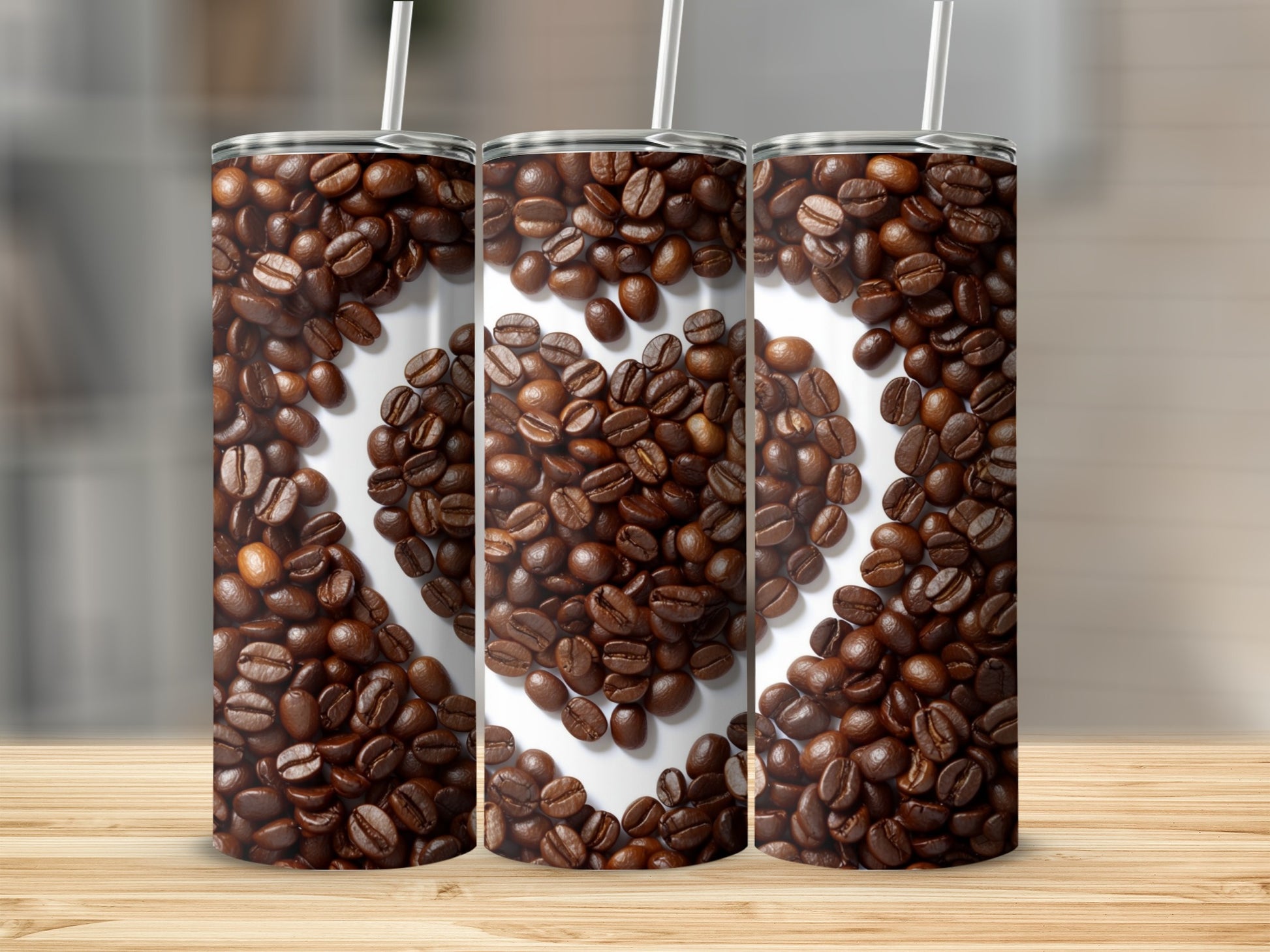Three tumblers featuring a heart shape made from coffee beans.