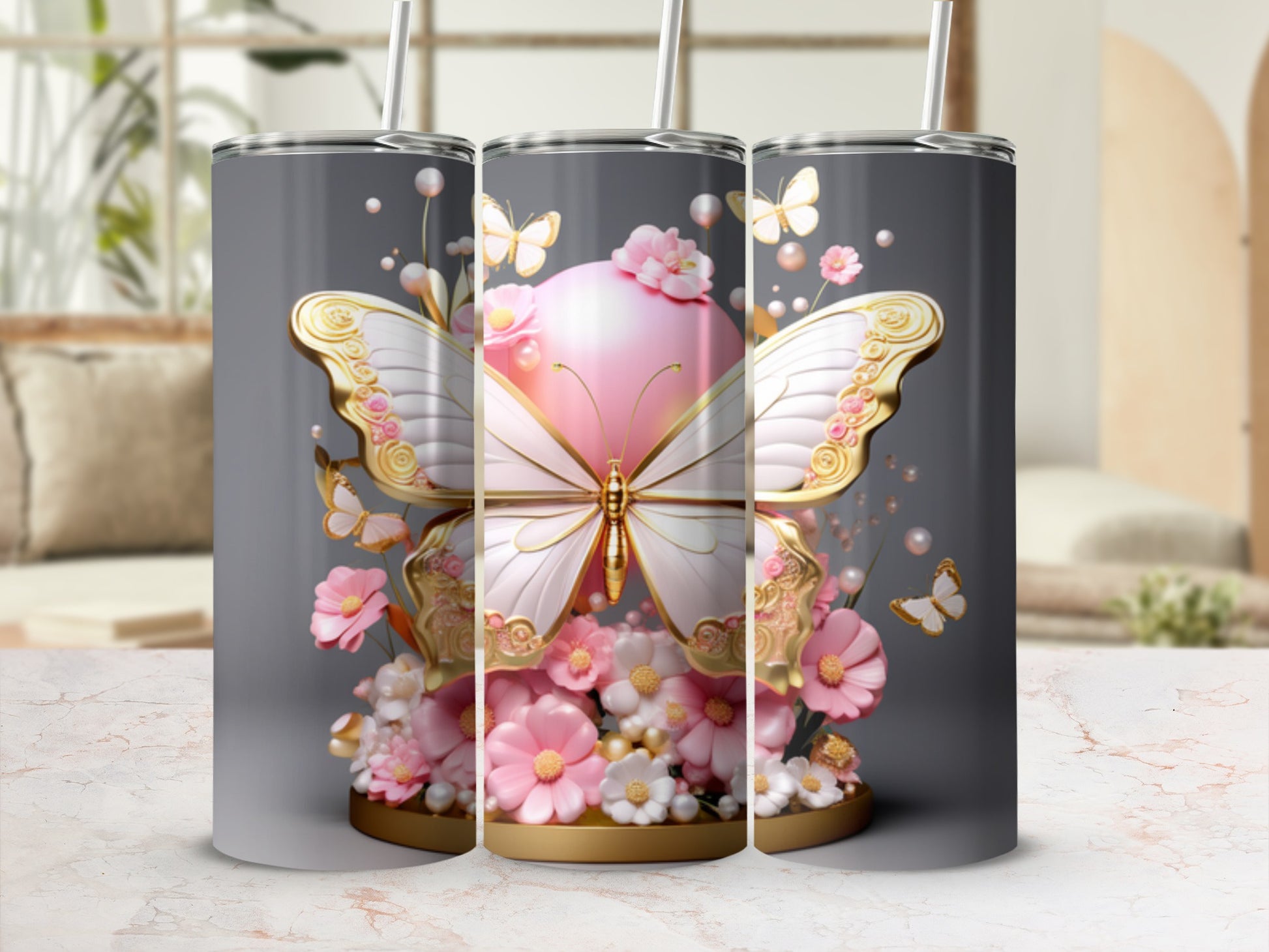 Pink and gold butterfly design on a stainless steel tumbler.