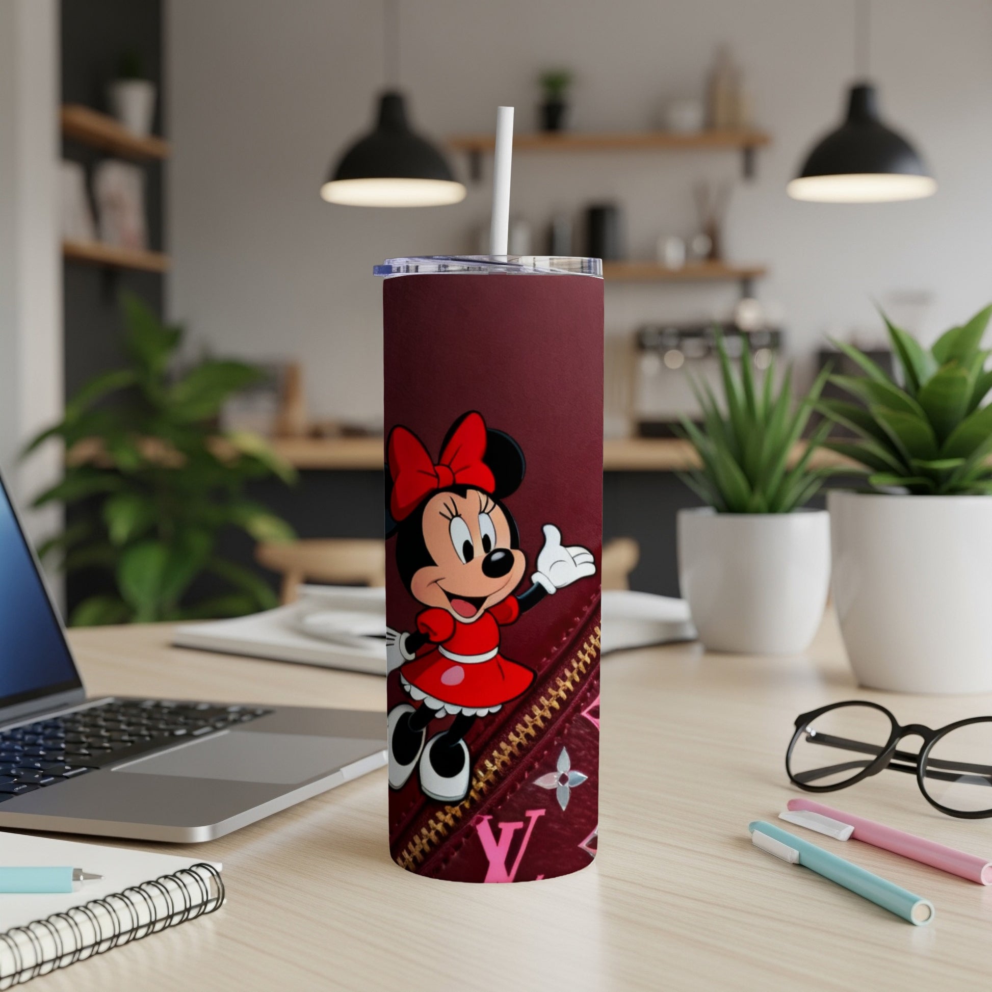 Minnie Mouse on a maroon tumbler with LV print accents.