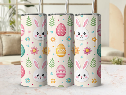 Three Easter bunny tumblers with floral and egg patterns.