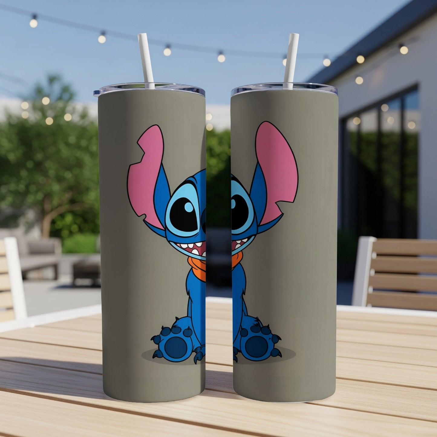 Two tall tumblers featuring a cartoon Stitch character with large ears and orange scarf.