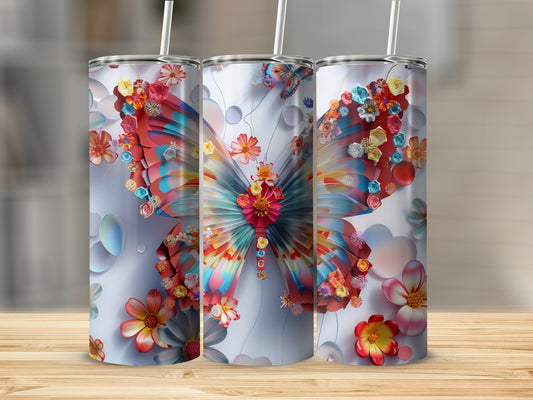 Three tumblers with colorful butterfly and flower designs.