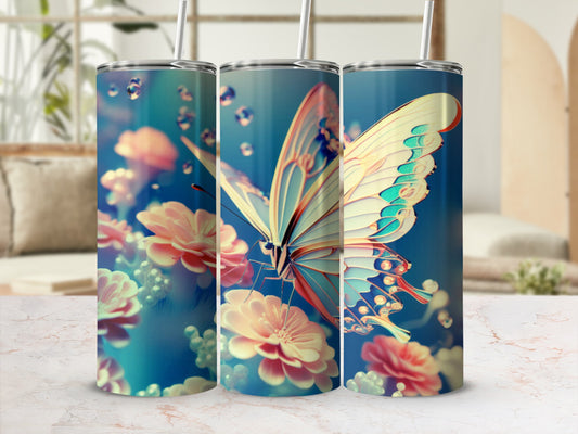 Three tumblers with a butterfly and floral design on a marble countertop.