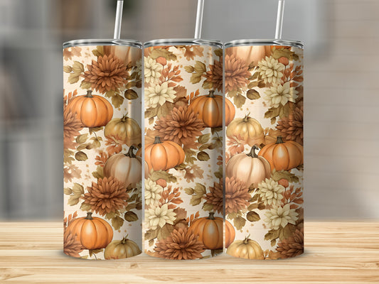 Three tumblers with a pumpkin and floral fall-themed pattern.