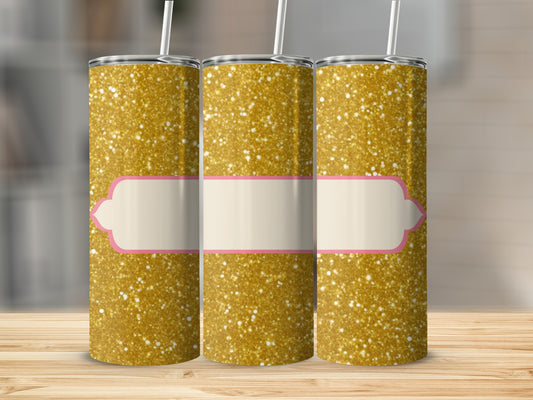 Three glitter tumblers with blank pink and cream label on wooden surface.