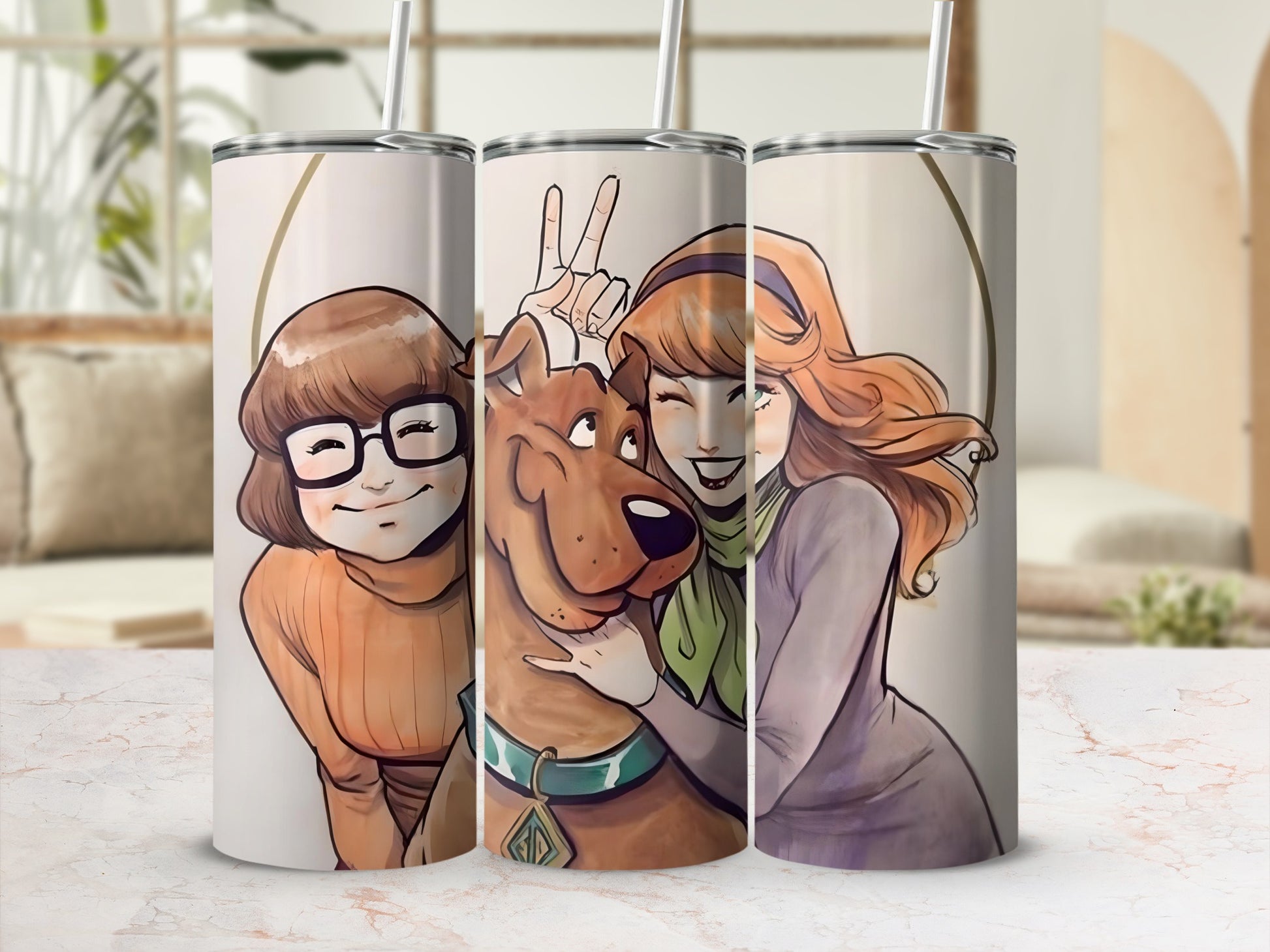 Scooby-Doo characters Velma and Daphne smiling on a tumbler.
