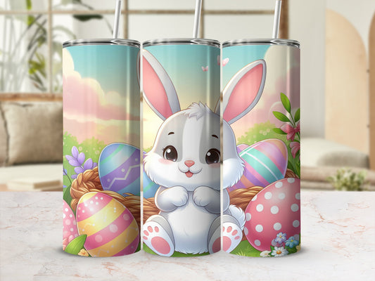 Cute Easter bunny sits in a basket with colorful eggs and flowers.