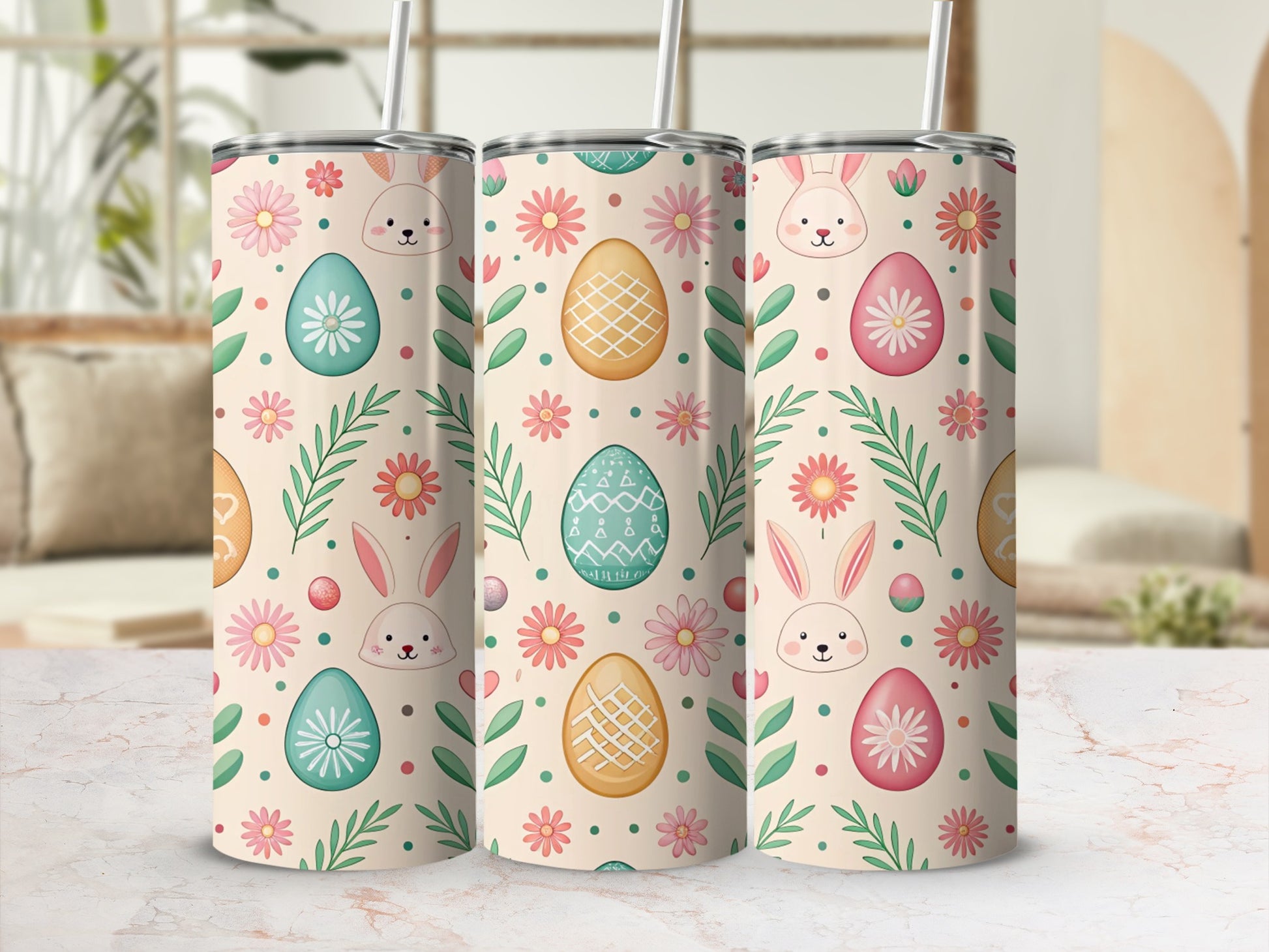 Three tall tumblers with bunny and Easter egg pattern.