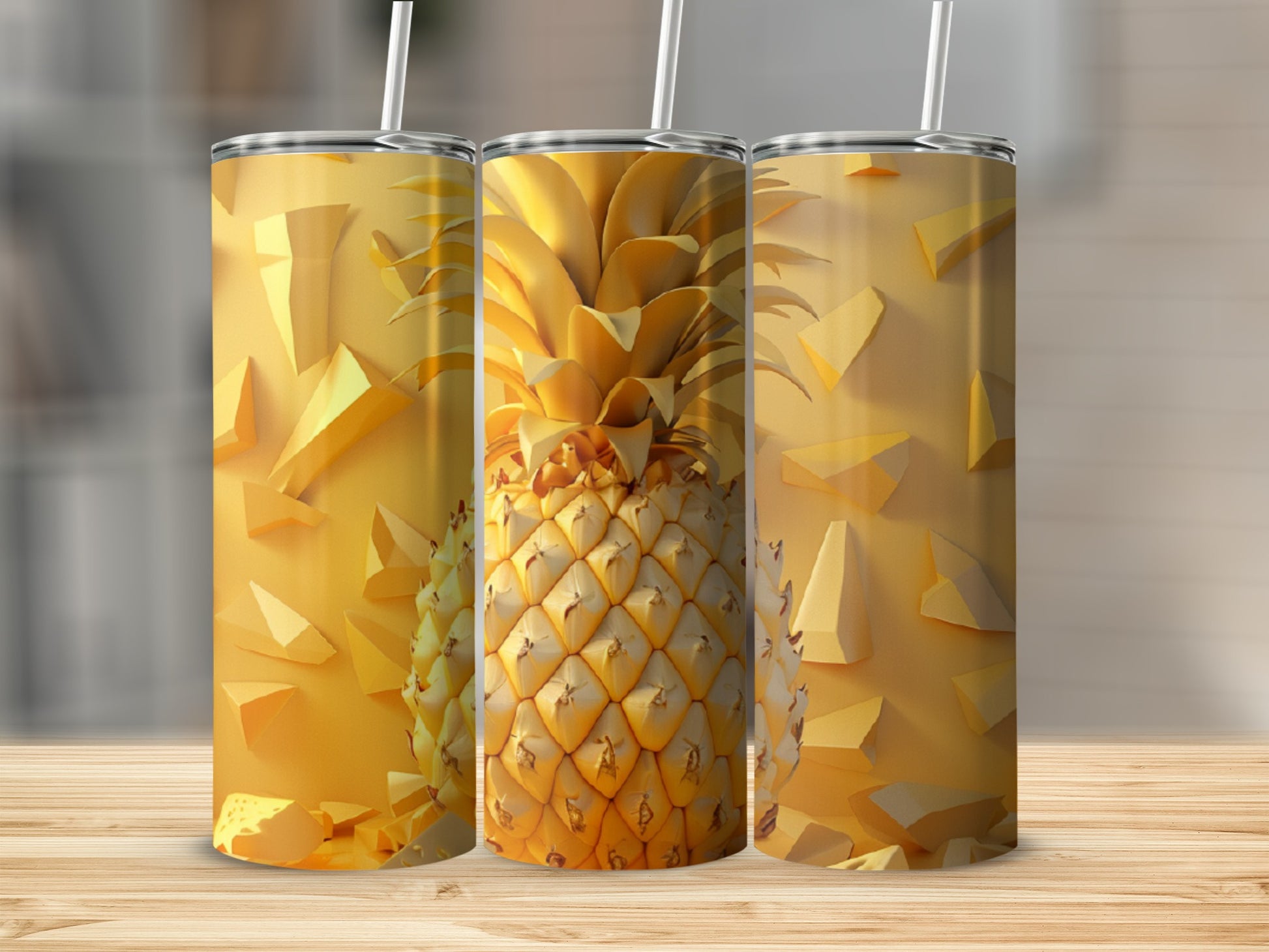 Gold pineapple pattern on a tumbler with geometric shapes.