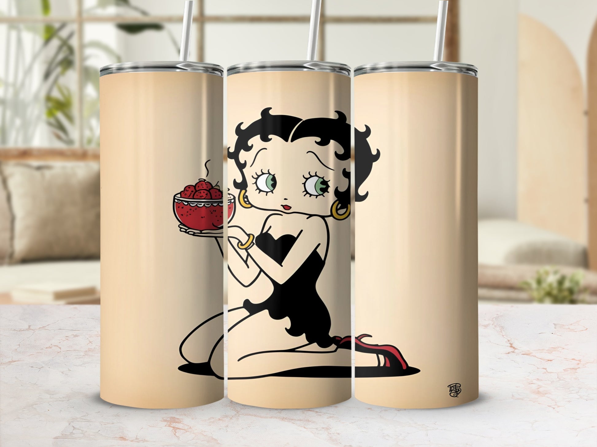 Betty Boop holding a bowl of strawberries on a beige tumbler.