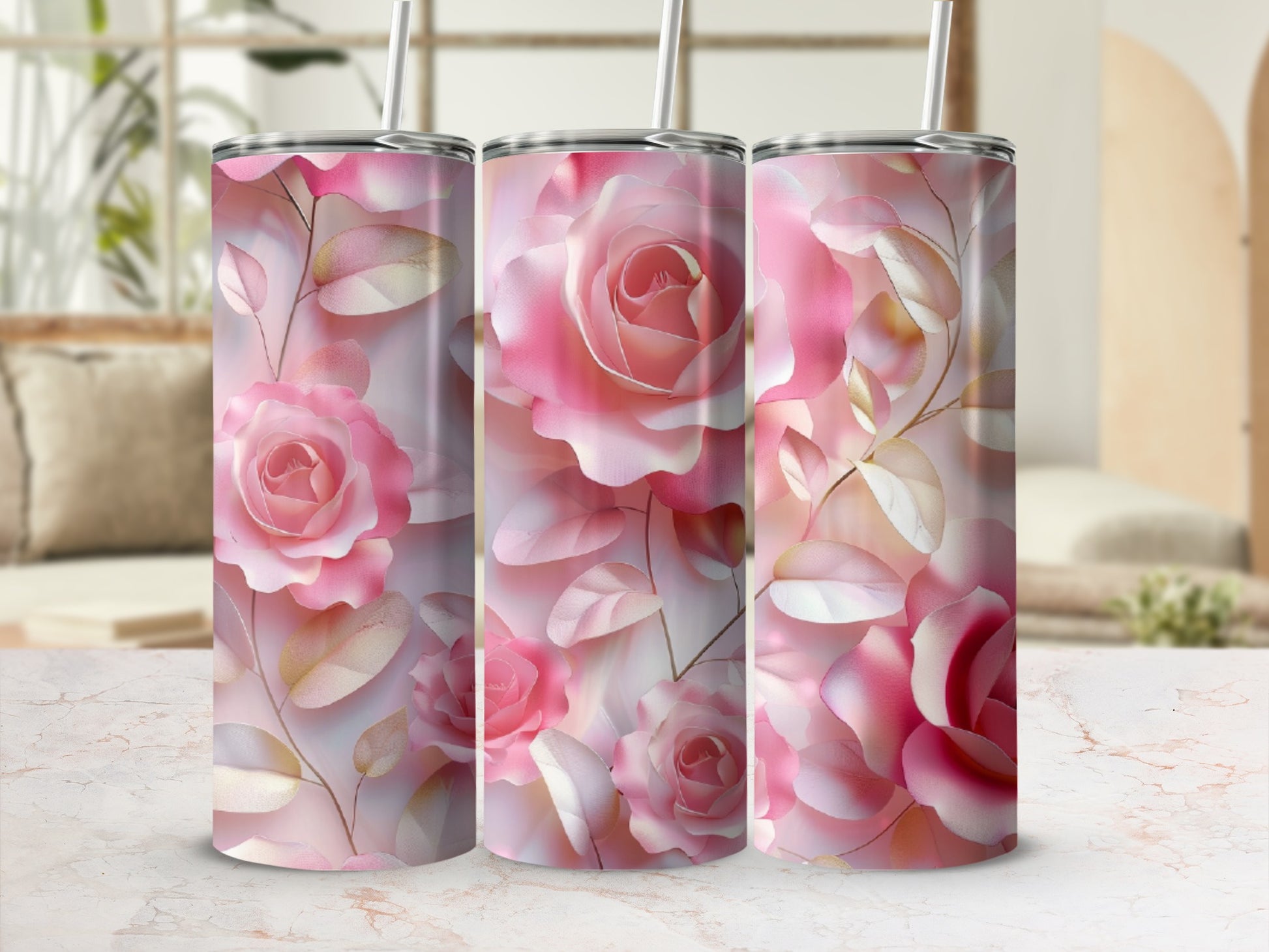 Pink roses and leaves pattern on three tumblers.