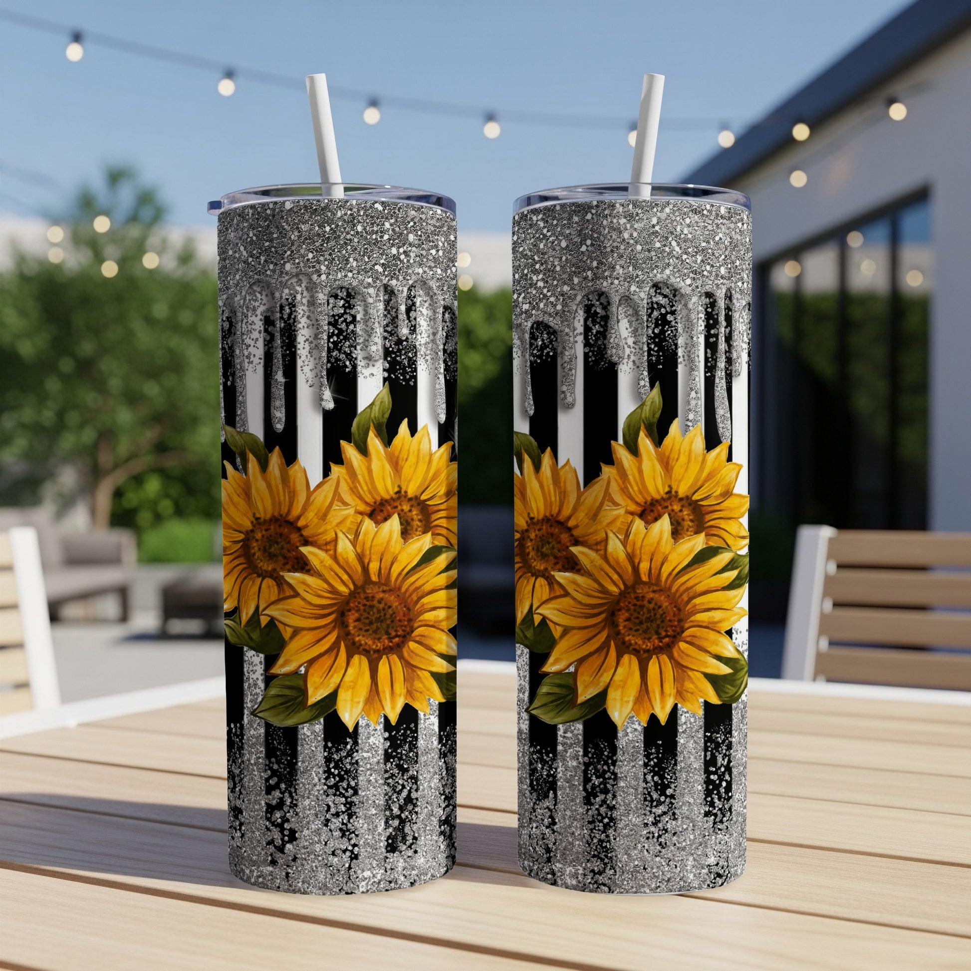 Two tumblers with sunflowers and black and white stripes.