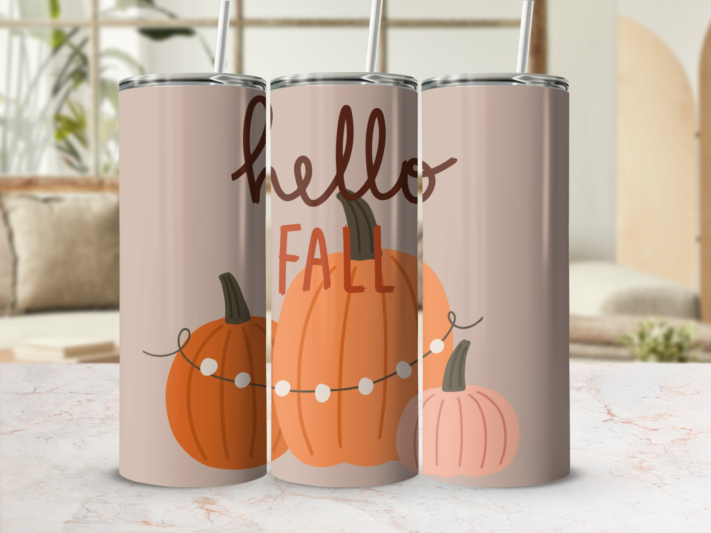 Three tall tumblers with pumpkins and "hello FALL" text on a light background.