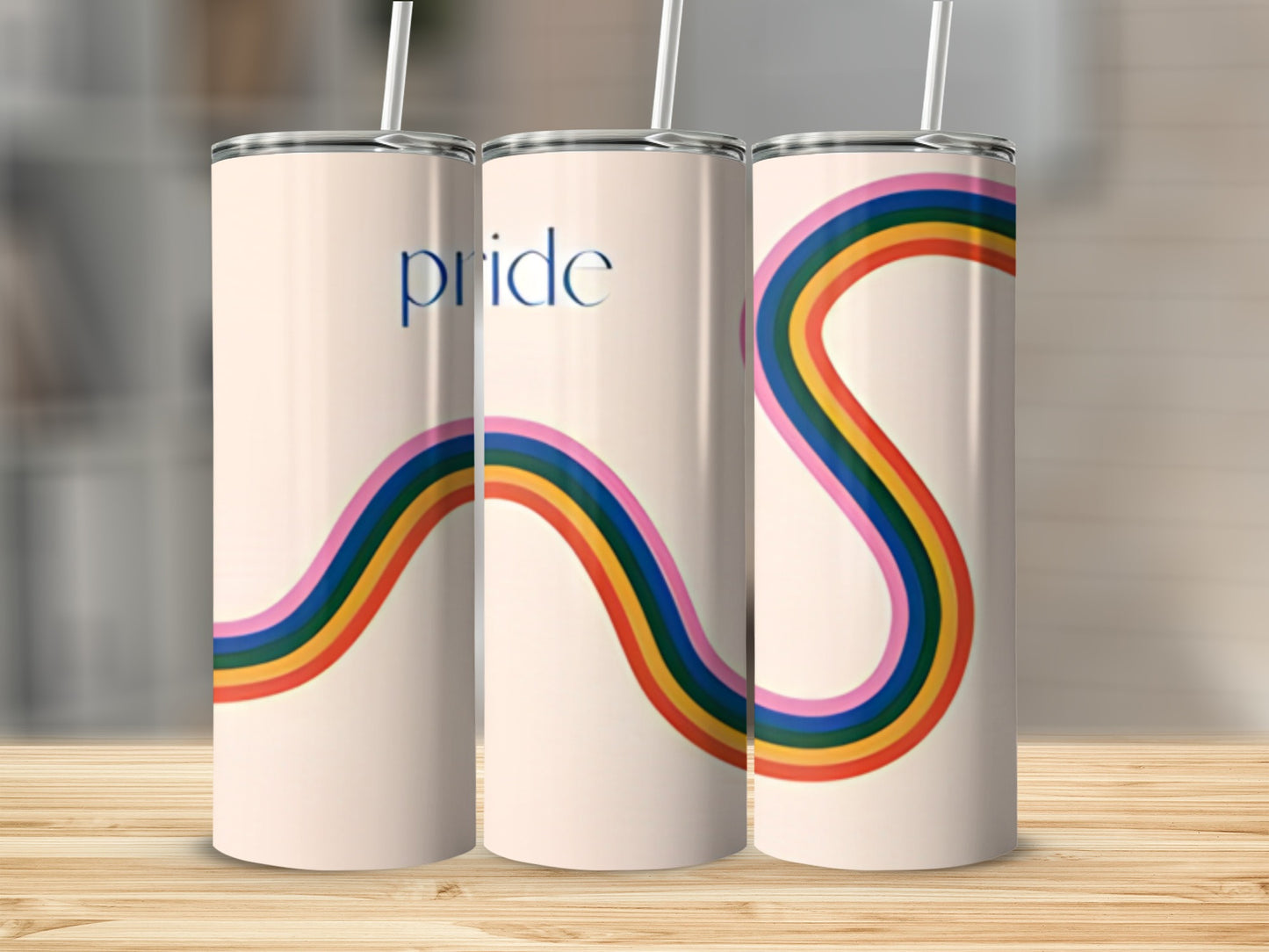 Pride tumbler with rainbow wave design.